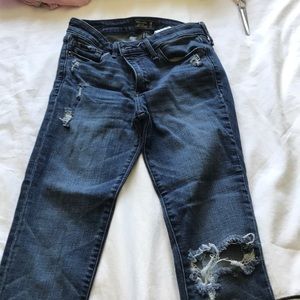 Ripped blue jeans